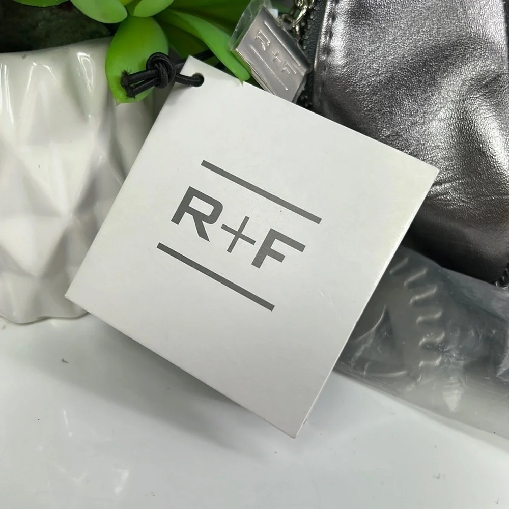 NWT Rodan + Fields Cosmetic Bag Silver with Tassel
